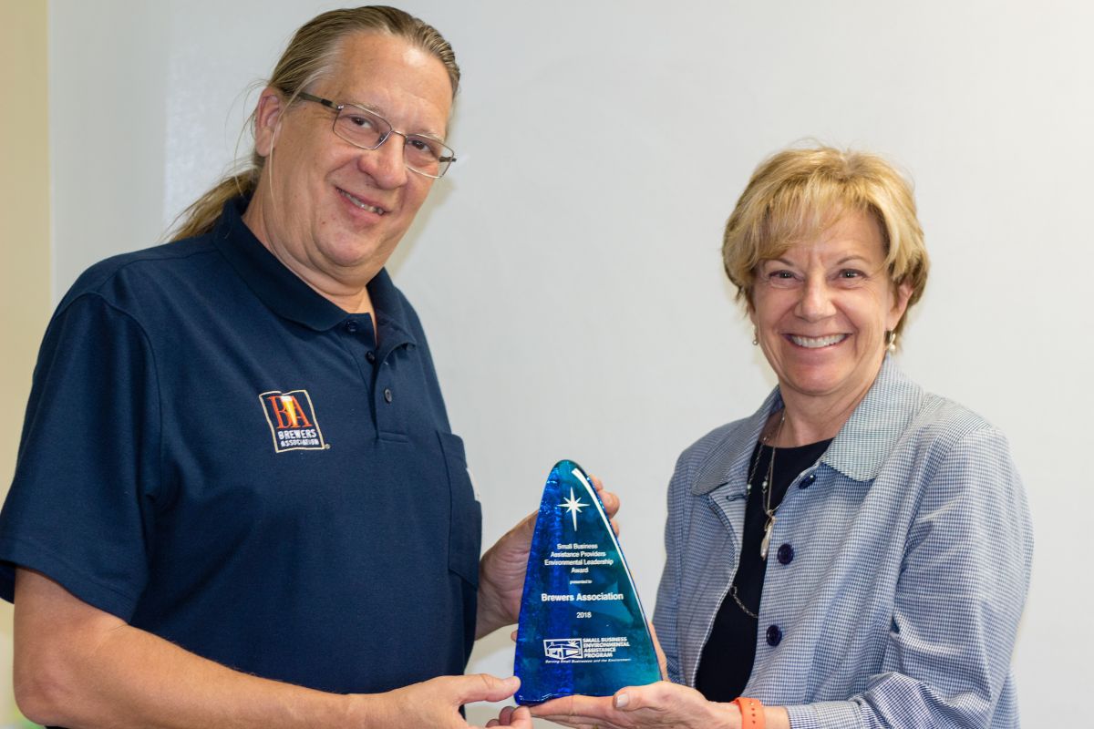 Chuck Skypeck of the National Brewers Association receiving the Business Assistance Providers Environmental Leadership Award.