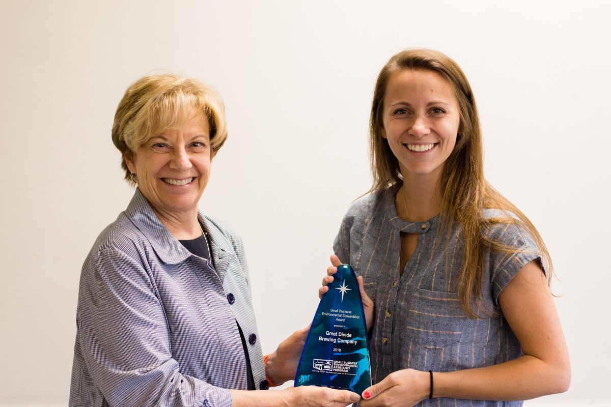 Erin Cox of Great Divide Brewing Company receiving the Small Business Environmental Stewardship Award.