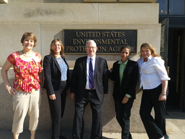 Image of conference attendees outside EPA building.