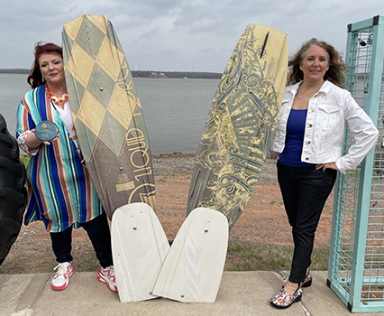 Calypso Cove owners with boards